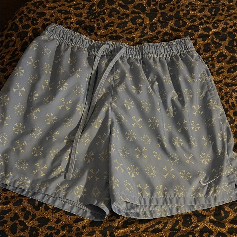 Nike Light Blue Athletic Shorts with Cream Graphic Print